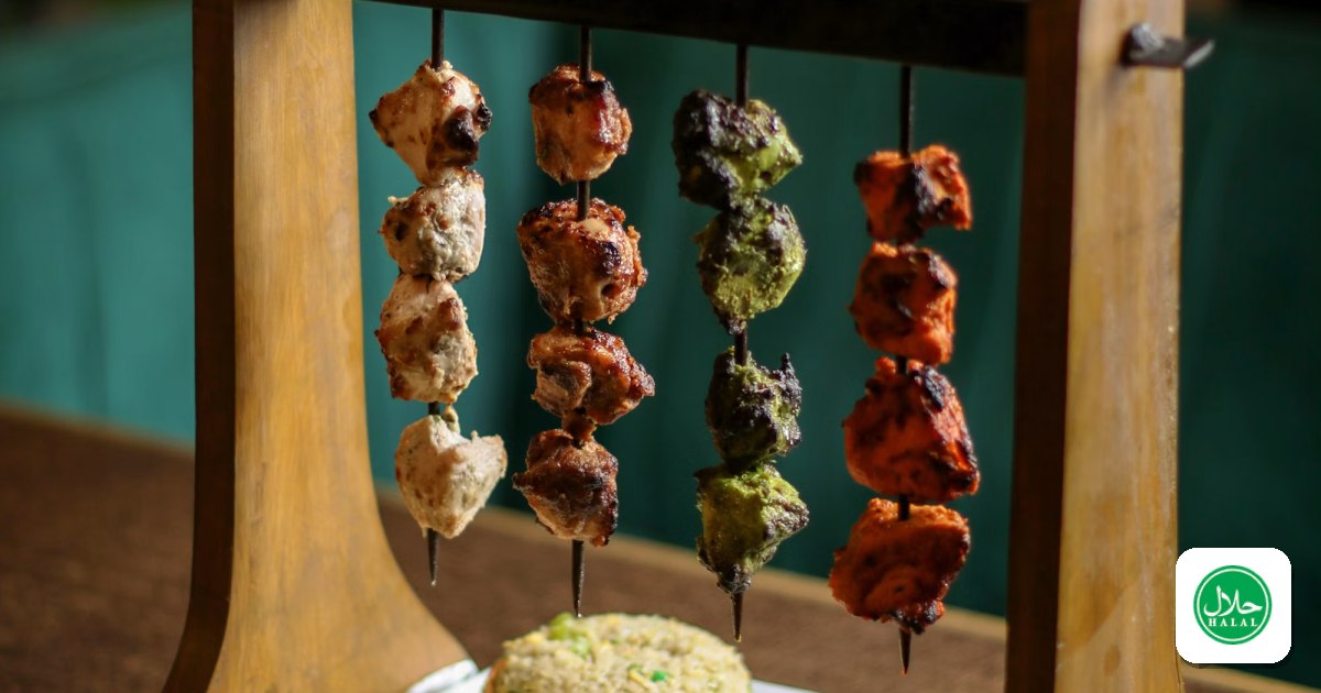 Grilled kebab skewers served with rice and fresh naan