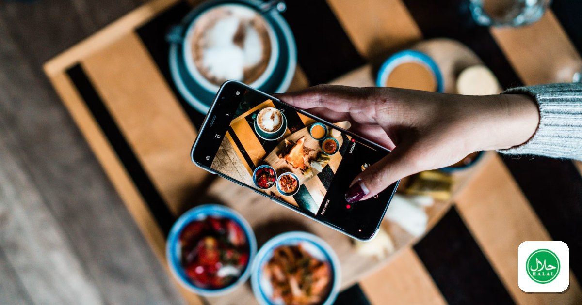 Someone photographing a spread of food with their phone