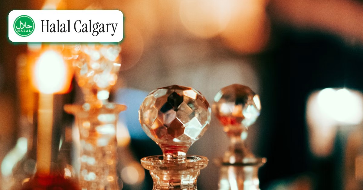 Crystal perfume decanters lit by candlelight