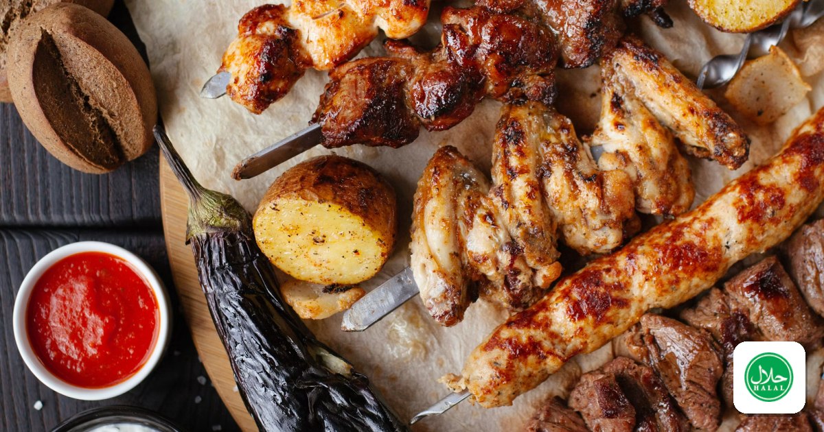 A mixed grill platter of kebabs with flatbread and dipping sauces