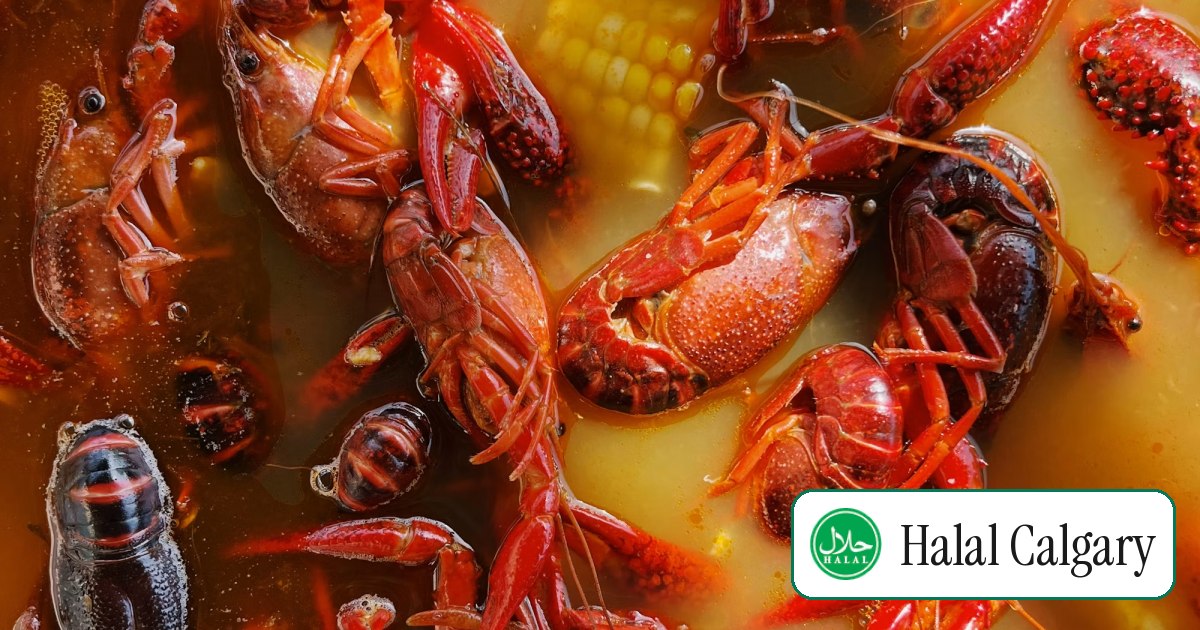 Crawfish and corn in a seafood boil pot