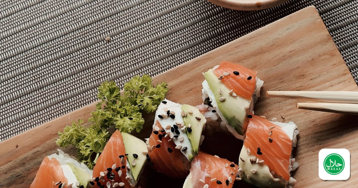 Fresh sushi rolls and nigiri arranged on a serving board