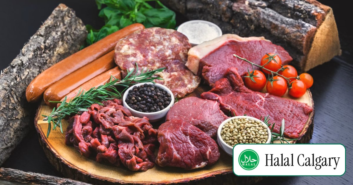 A butcher's board spread with fresh cuts of beef, sausages and herbs
