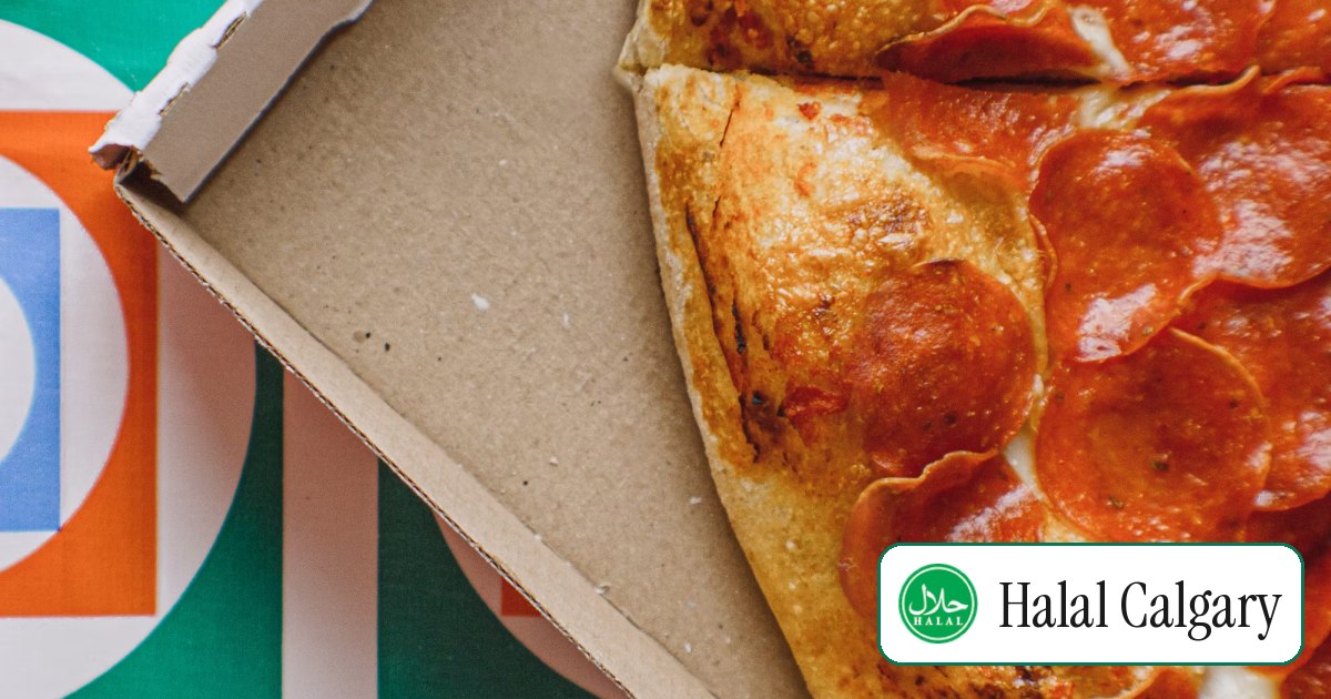 A pepperoni pizza in an open delivery box, seen from above
